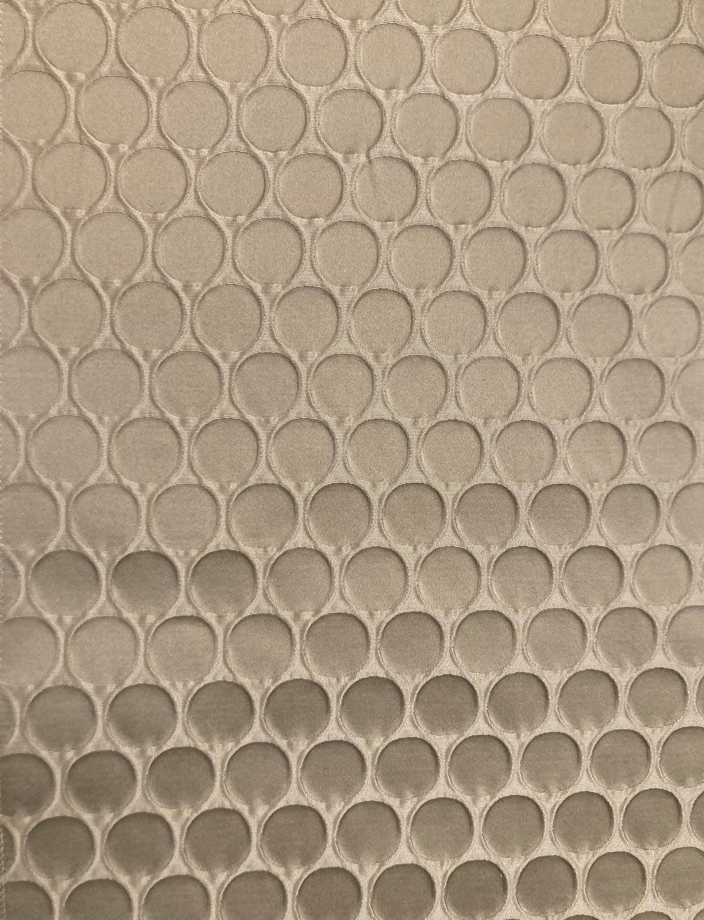 design with tightly spaced circles and raised texture