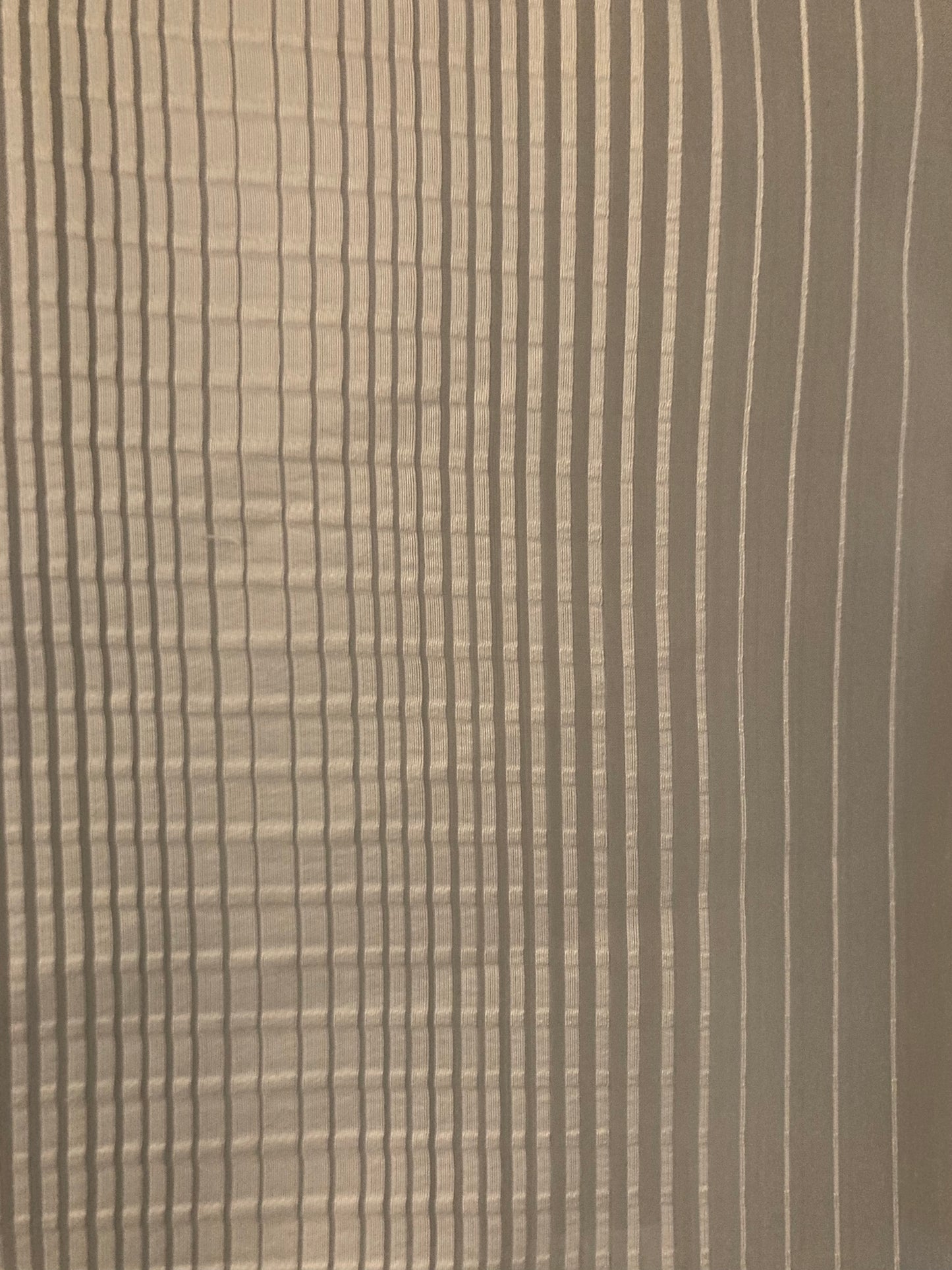 Sheer fabric which allows light to filter through.