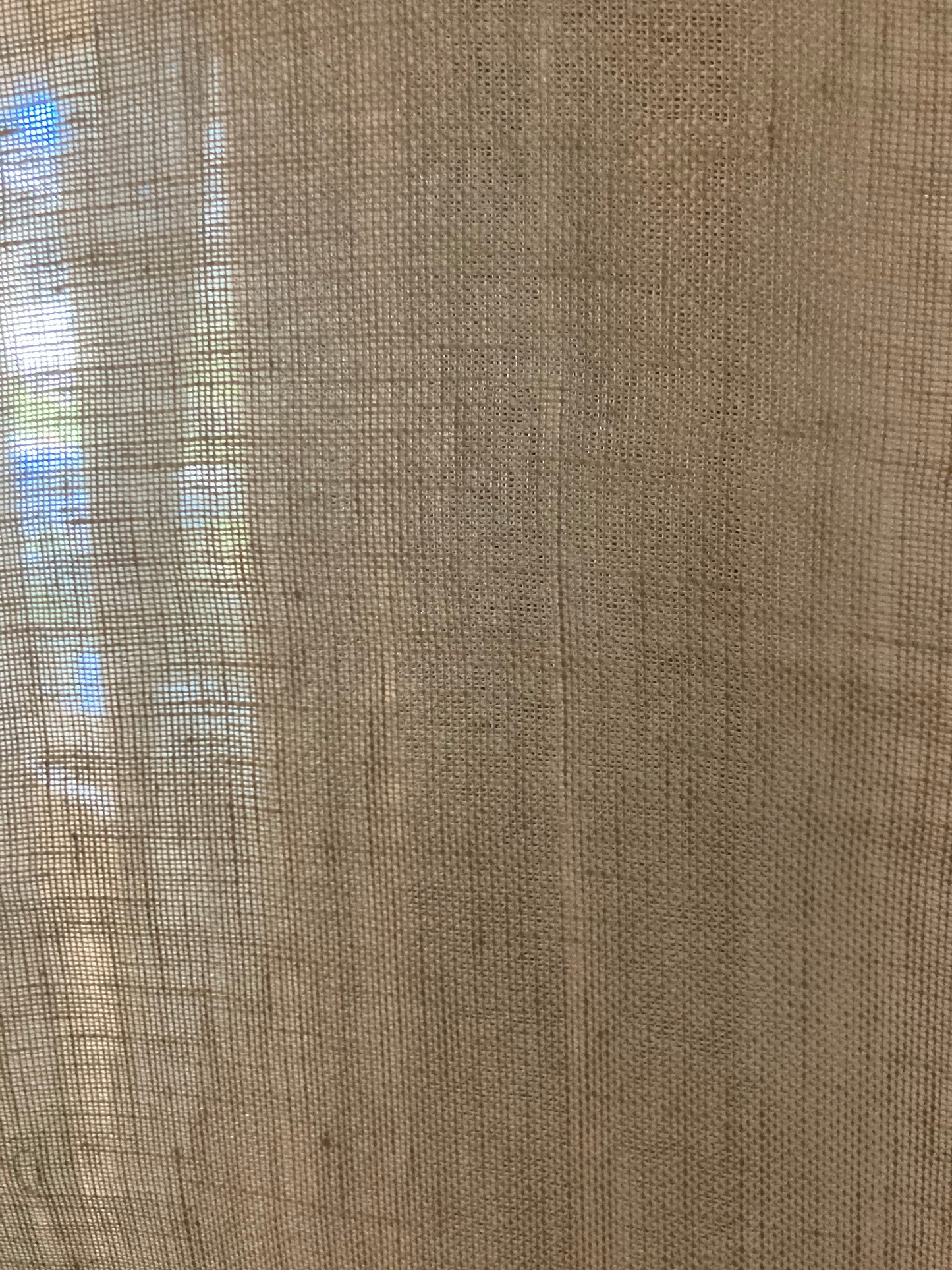 Linen Sheer fabric which allows light to filter through.