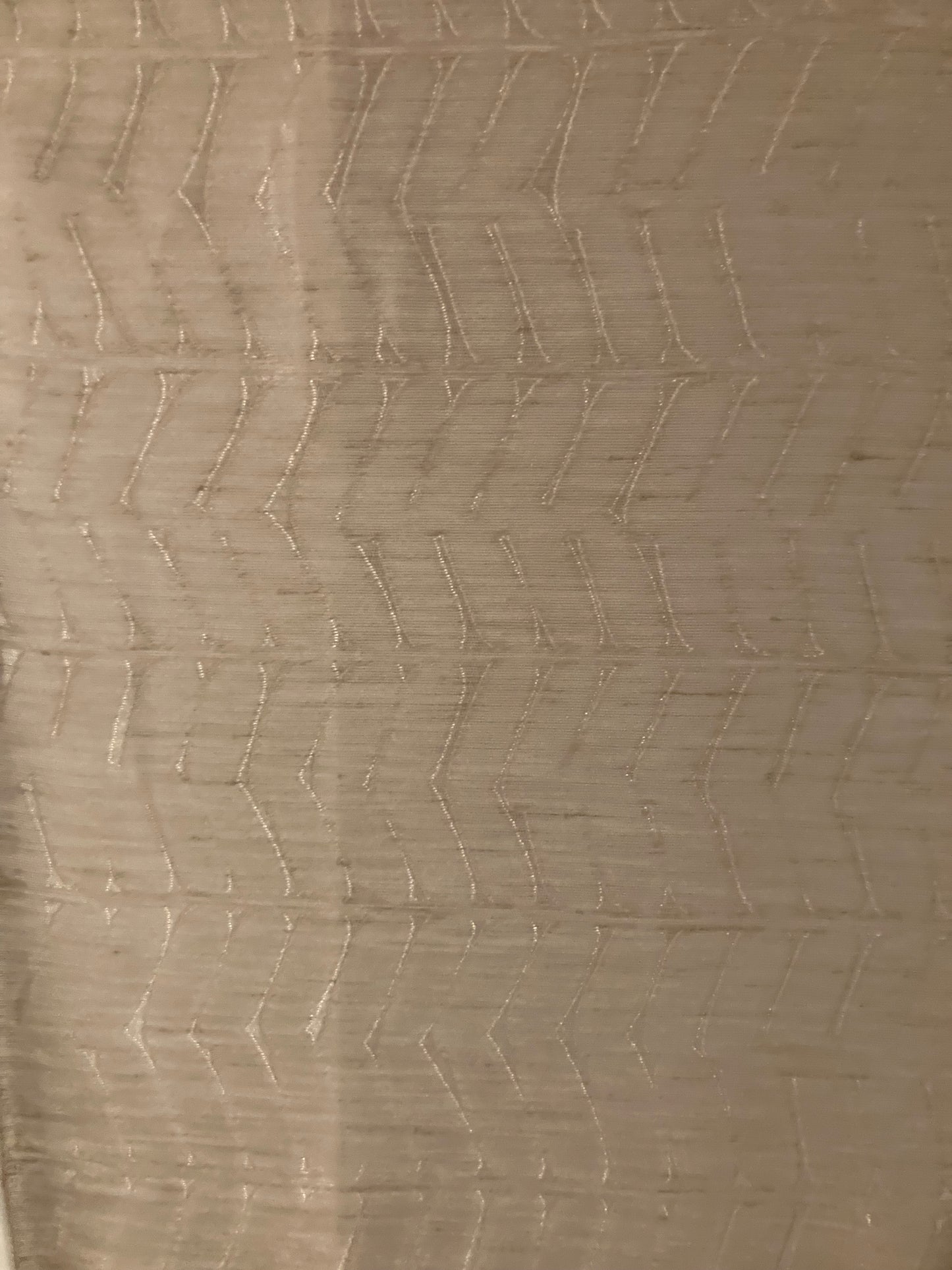 Sheer fabric with chevron motif