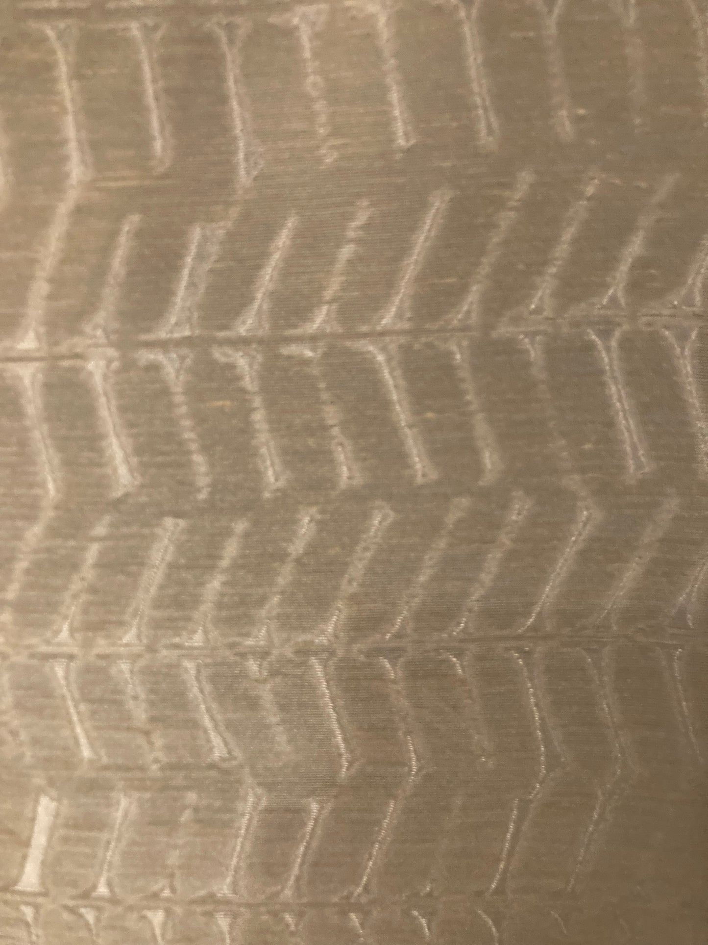 Sheer fabric with chevron motif
