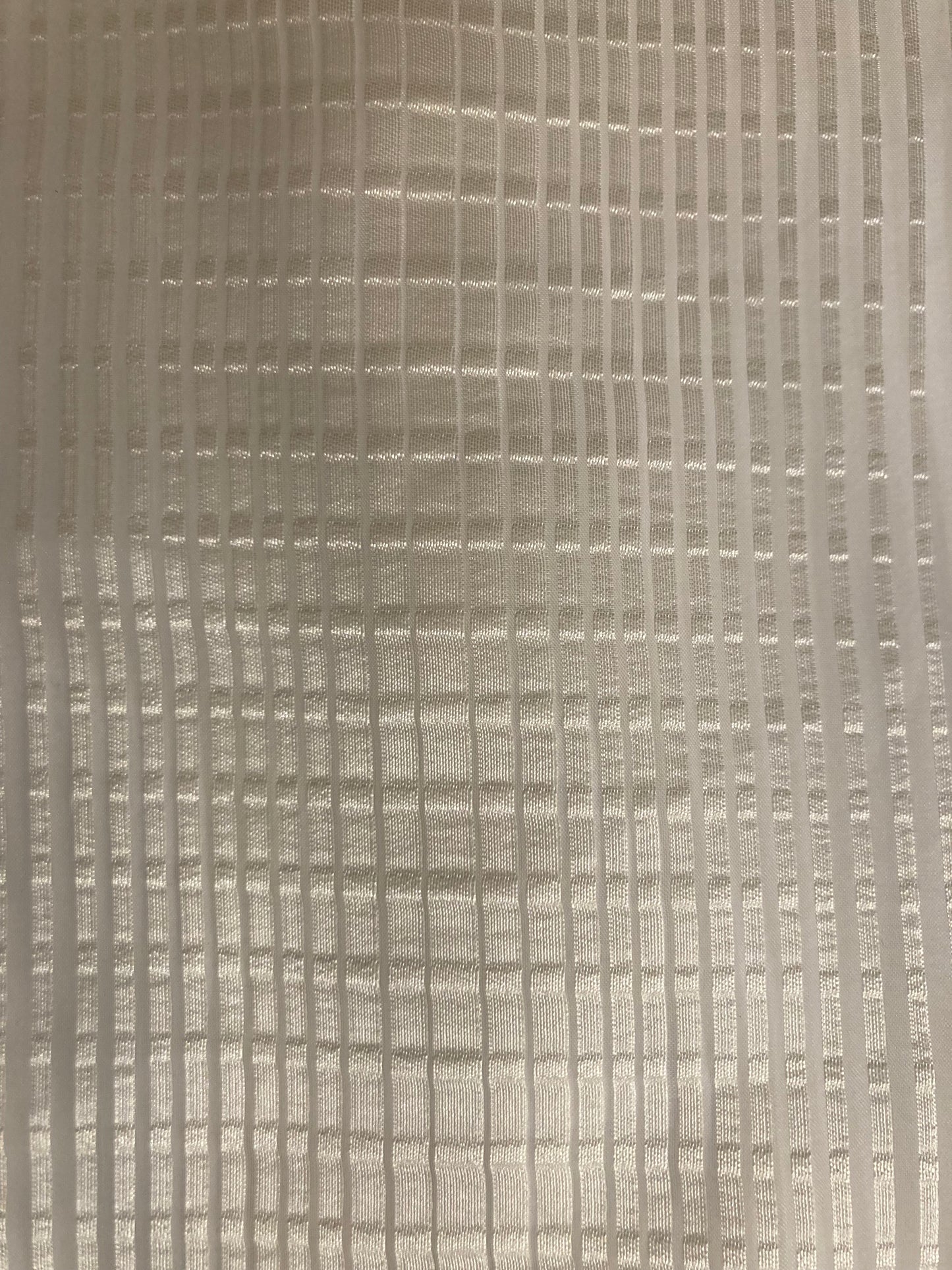 Sheer fabric which allows light to filter through.