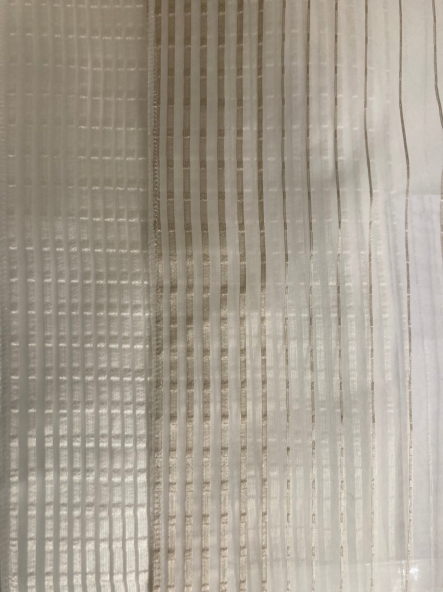 Sheer fabric which allows light to filter through.