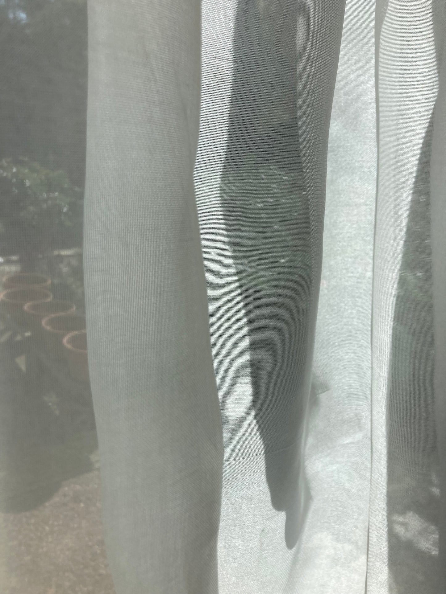 Sheer fabric which allows light to filter through.