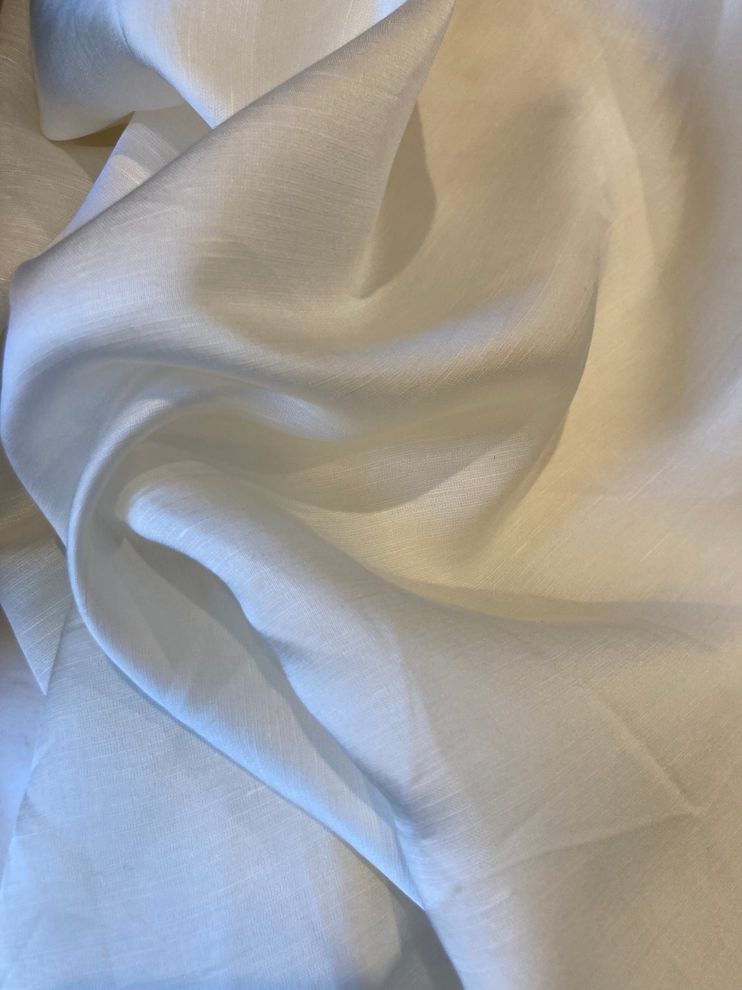 Linen Satin Sheer fabric which allows light to filter through.