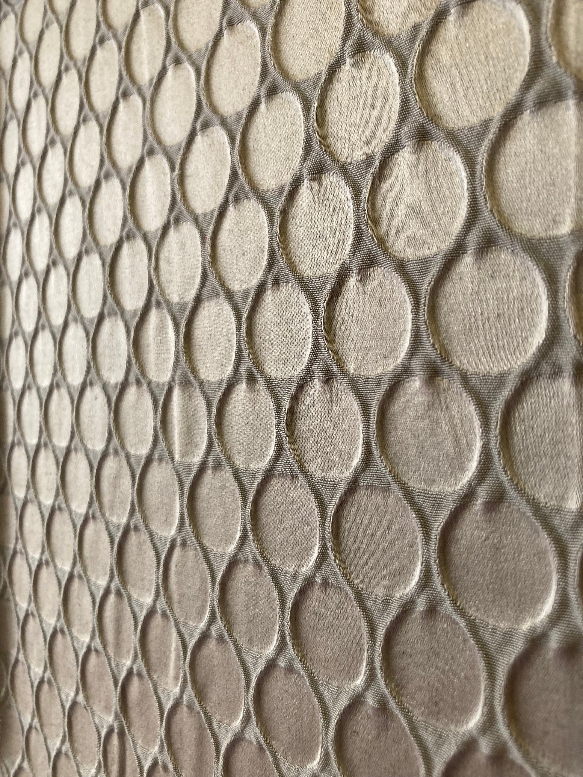 design with tightly spaced circles and raised texture